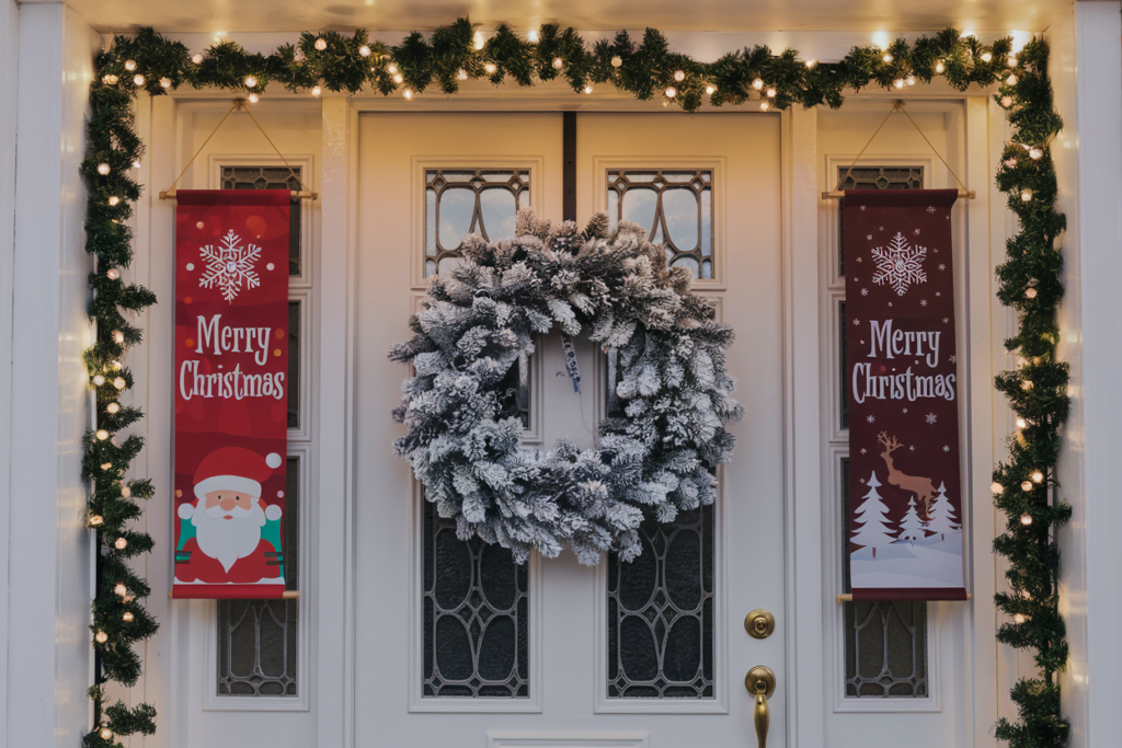Above the door, two vertical banners hang side by side.