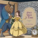 Animated scene depicting Belle in a yellow gown and the Beast beside an open storybook titled "Once Upon A Time." Symbolizes classic fairy tale theme.