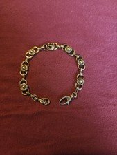 Vintage Gucci Gold Tone Bracelet. Designer GG Gucci Bracelet With Floral Pattern