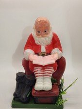 Vintage Blow Mold Santa Claus Sitting in Chair Reading the Newspaper READ