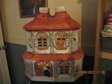 VTG HALLOWEEN COOKIE JAR WITH BATS AND WITCHES AND PUMKINS 10 INCHES TALL