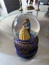This is a "Beauty and the Beast" snow globe.