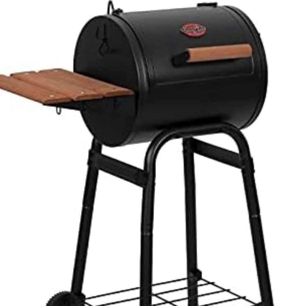 Black portable charcoal grill with wooden side shelf, designed for outdoor cooking and barbecuing. Ideal for backyard gatherings and camping trips.