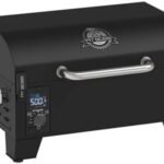 Pit Boss pellet grill featuring an easy-to-read digital display and durable black design, perfect for outdoor cooking and grilling enthusiasts.