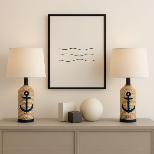 Stylish coastal decor featuring two anchor-themed lamps on a modern console table, complemented by abstract wall art and decorative geometric shapes.