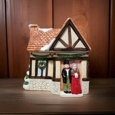 This item Is A Vintage Ceramic Cookie Jar Shaped Like A Victorian Christmas Cott