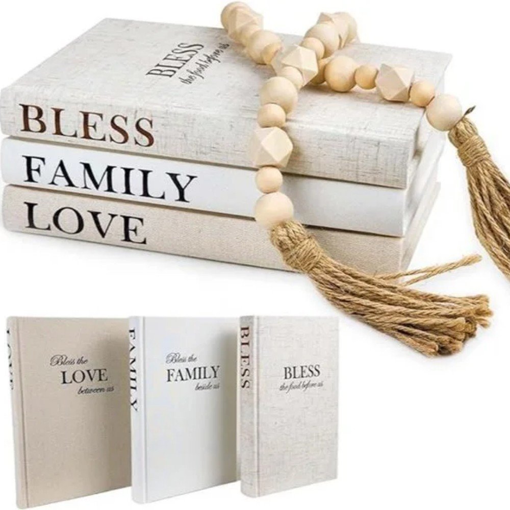 Decorative books with titles "Bless," "Family," and "Love," accompanied by wooden beads and tassels, perfect for home decor and family themes.