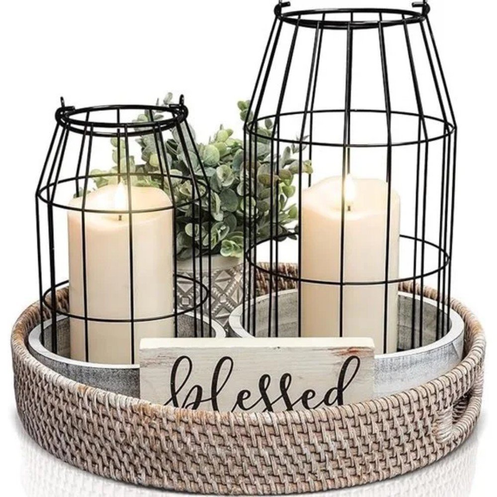 Decorative candle holders with greenery in a woven tray, featuring a "blessed" sign, perfect for home decor and cozy ambiance.