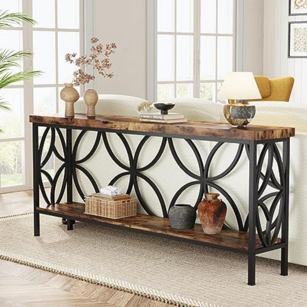 Stylish wooden console table with metal frame, decorative vases, and books, enhancing modern living room decor with a warm, inviting atmosphere.