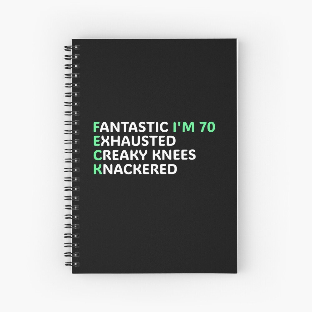 Spiral notebook featuring humorous text about aging: "Fantastic I'm 70, exhausted, creaky knees, knackered." Perfect gift for seniors or those embracing their age.
