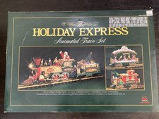 The HOLIDAY EXPRESS Animated Christmas Train Set #380 New and Complete
