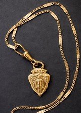 Gucci Vintage GG Pendant Necklace Brass Knight Coat Of Arms Logo Zipper Charm
