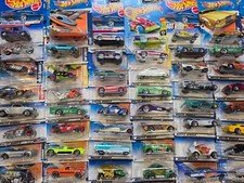 Hot Wheels - Mystery Lot of 25 Brand New Cars and Trucks from 1990s to Present