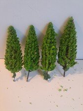 TRAIN SET DECORATIVE TREES SET OF 4 INDIVIDUAL USED IN GOOD CONDITION