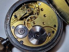 antique Omega pocket watch metal cased 51 mm gents size collectible