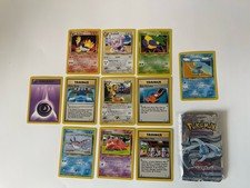 Pokémon Neo Genesis Opened Booster Pack With Cards 11 Cards Total.