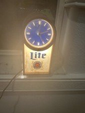 vintage-lighted-beer-clocks