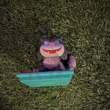 Disney Cheshire Cat Glow in the Dark Plastic Figurine FAC-046670-22188 (Purple)