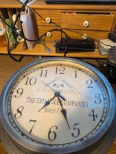 vintage advertising clock